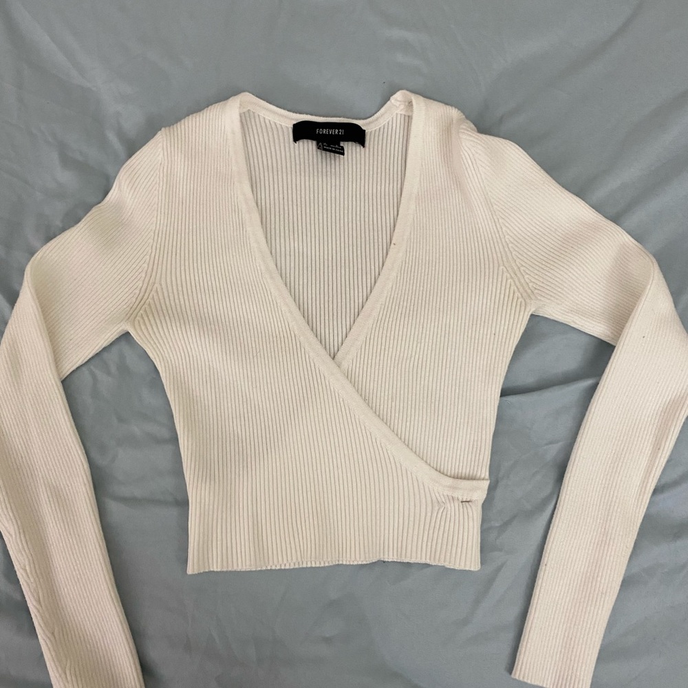 White long sleeve shirt .